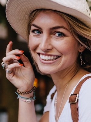 Woman in sunhat smiling