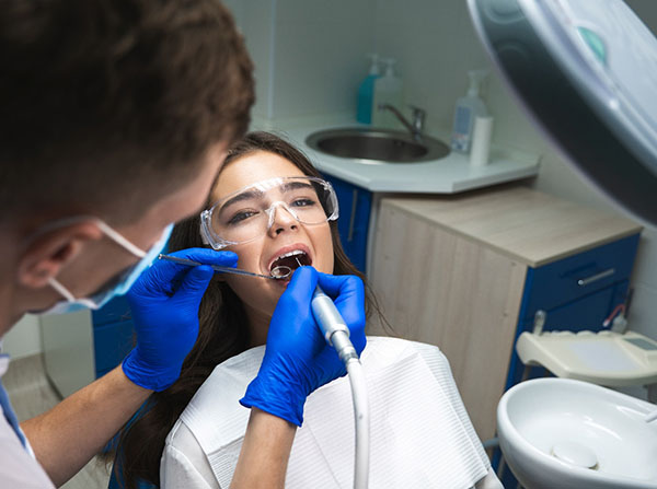 woman getting root canal in Leesburg   
