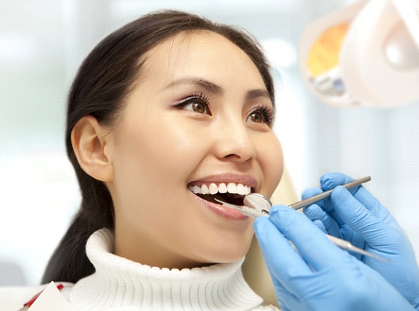 Woman at dentist for dental bonding