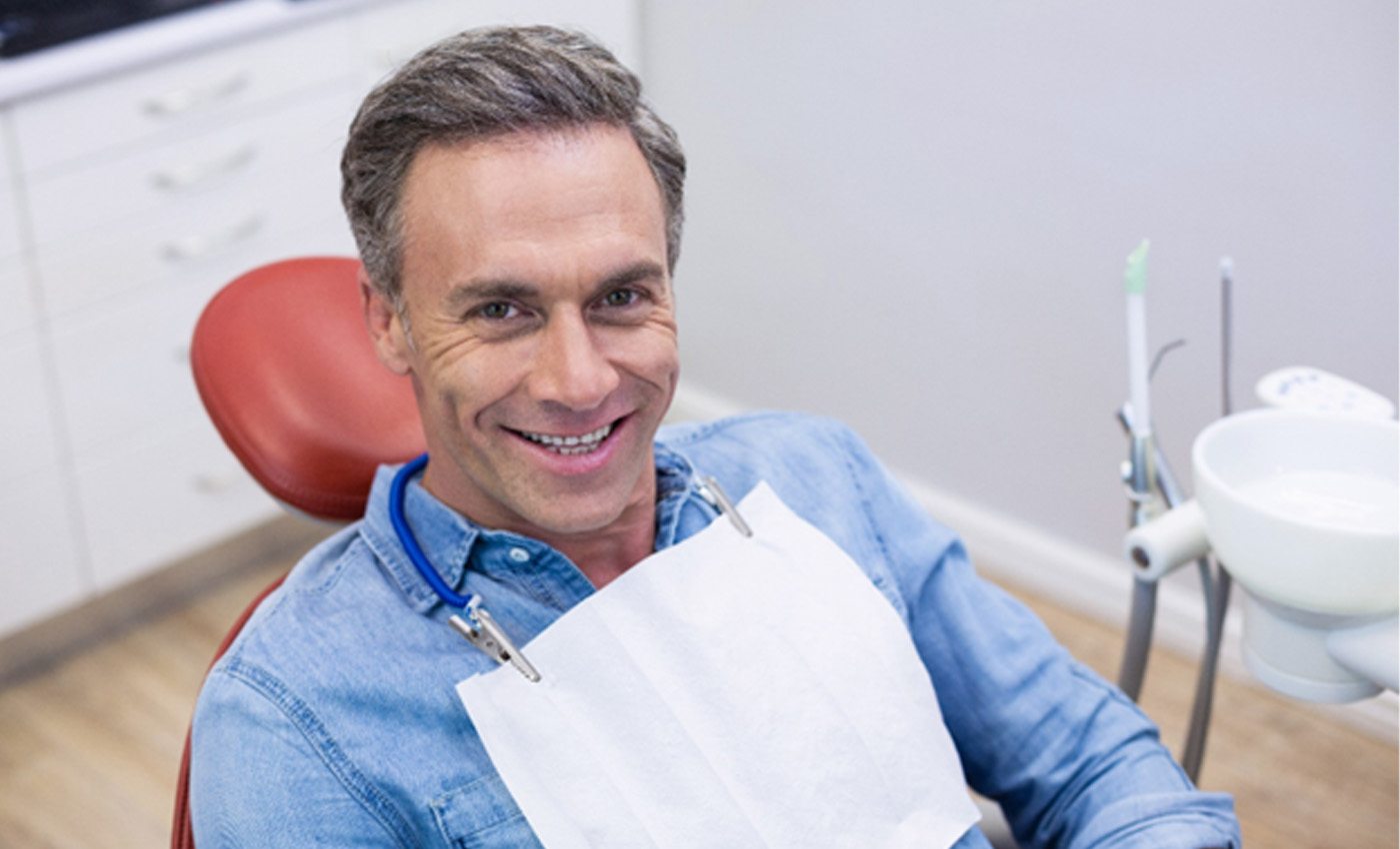 Man smiling after laser dentistry in Leesburg, VA