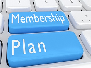 Keys on keyboard labeled membership plans