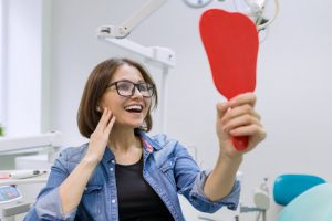 Happy patient enjoying dental implant success in Leesburg