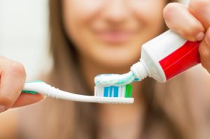 Woman brushing her teeth